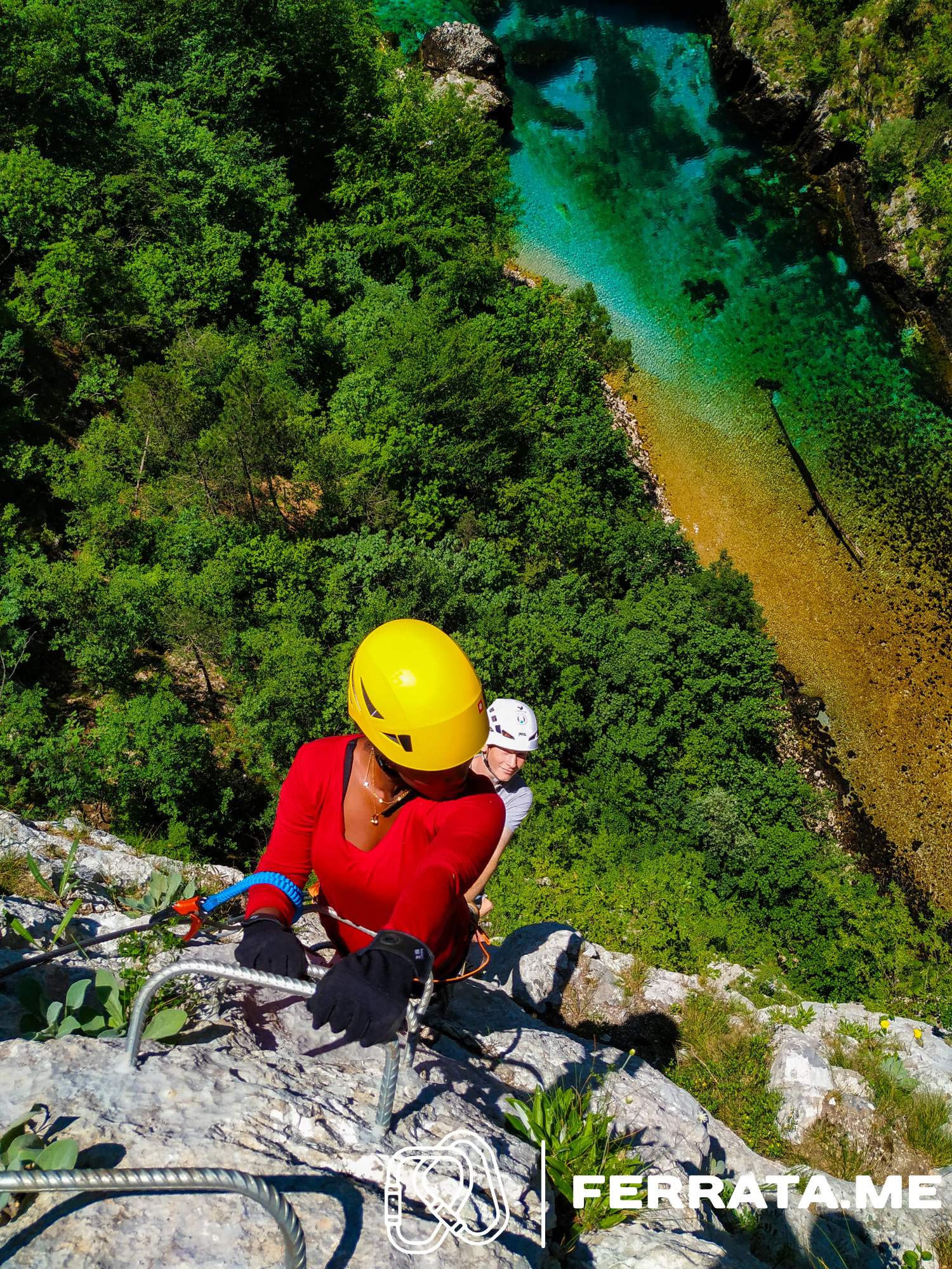 Adventurer overlooking the Piva Canyon and lake near Plužine, Montenegro